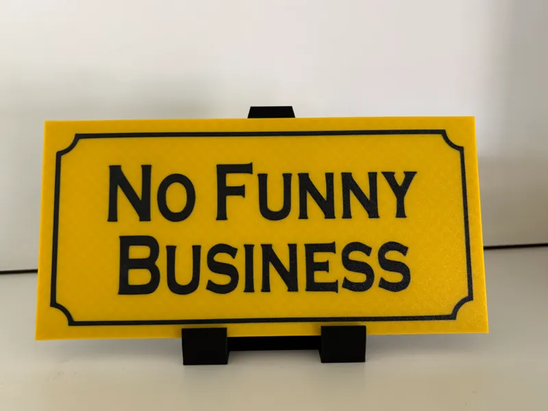 No Funny Business sign