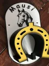 with additional hooks for hoof picks and similar items