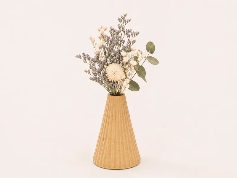 A mini vase suitable for a dollhouse.