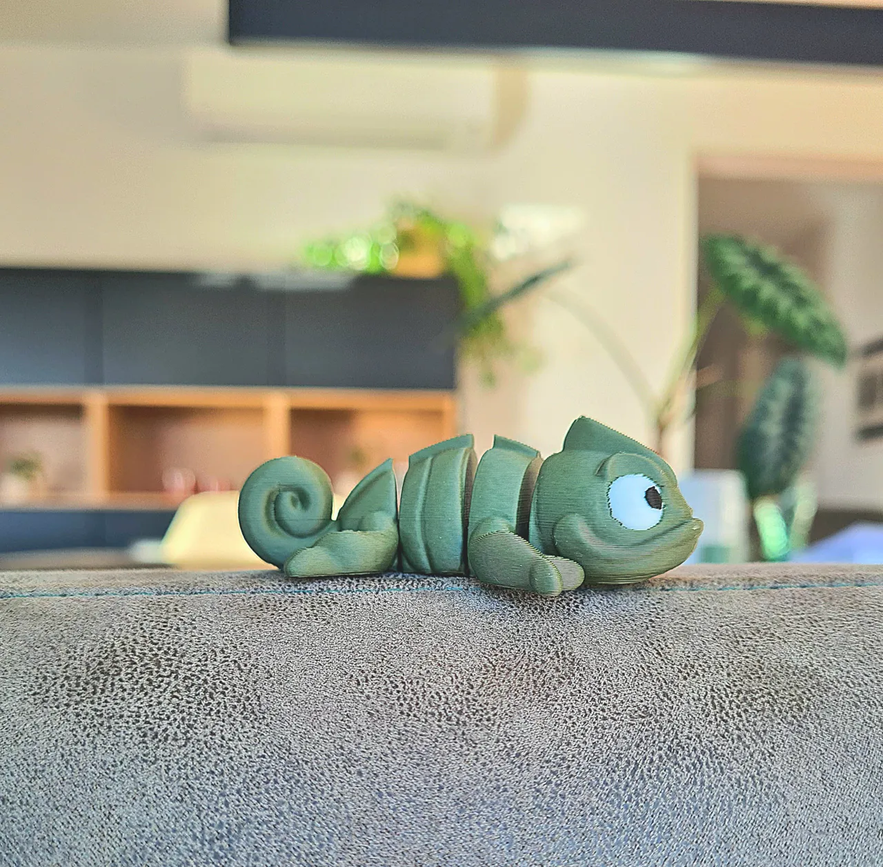 Cute little articulated Chameleon view 3
