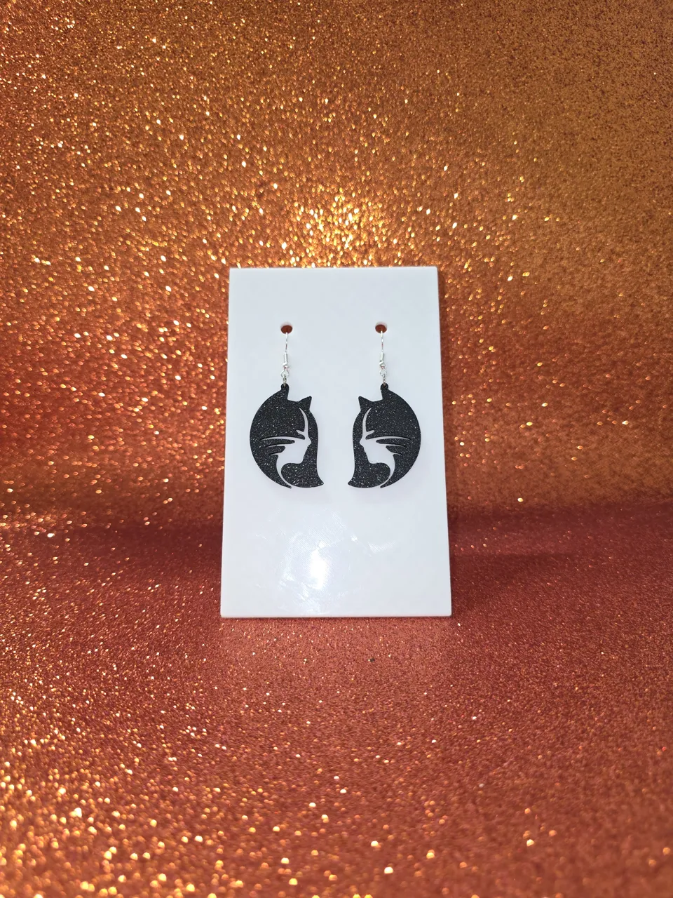 Cat woman earrings view 2