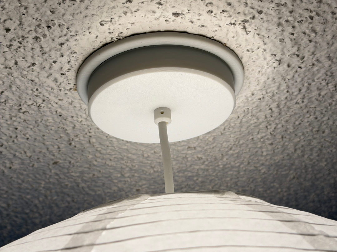 Ceiling light trim ring to cover junction box