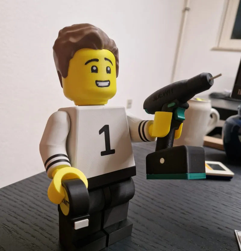 Worker brick man with drill and measuringtape