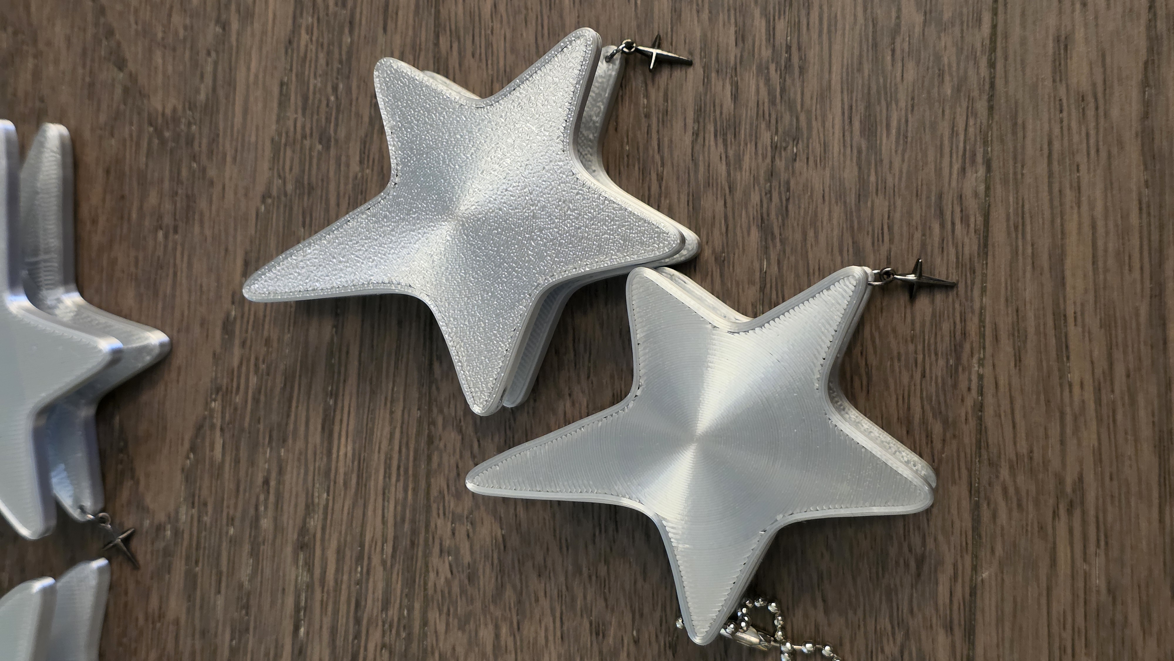 Miniatura 1 do modelo 3D 五角星有线耳机绕线器