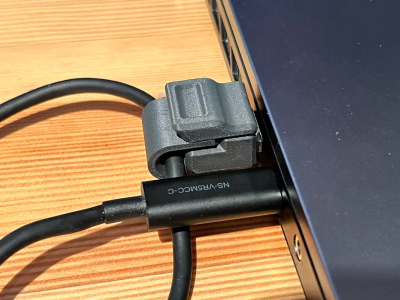 Tethering wire holder.