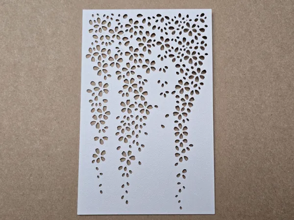 Pochoir motif feuilles et fleurs tombantes