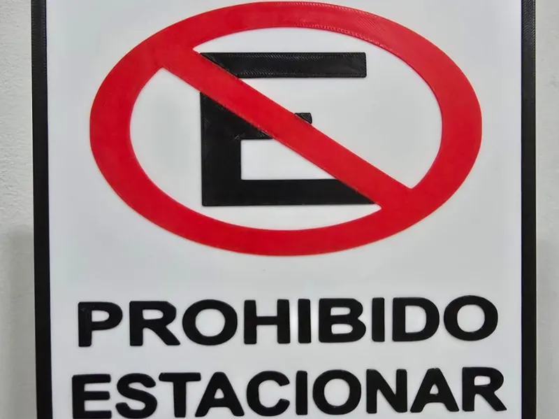 cartel prohibido estacionar