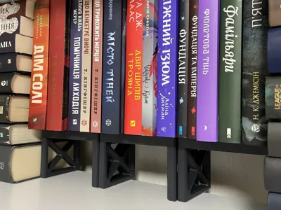 Book raiser for bookshelf