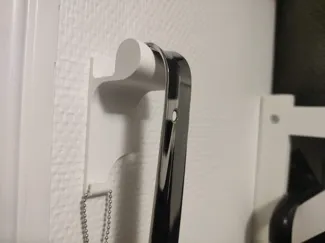 Shoe horn wall hanger