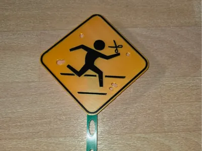 Postal Running With Scissors Sign