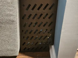 behind couch block