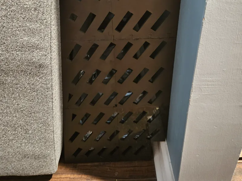behind couch block