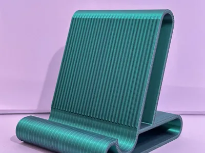 Phone stand with cable compartment