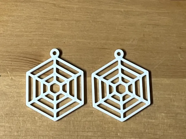 web earrings