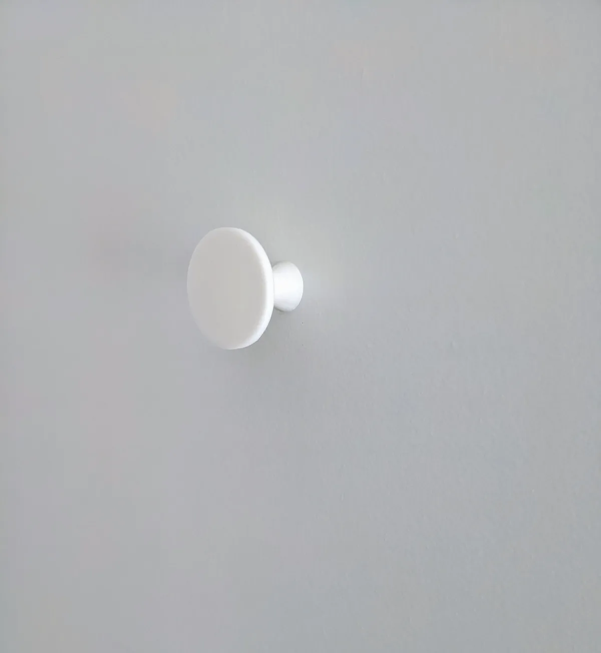 Bouton de meuble avec portemanteau