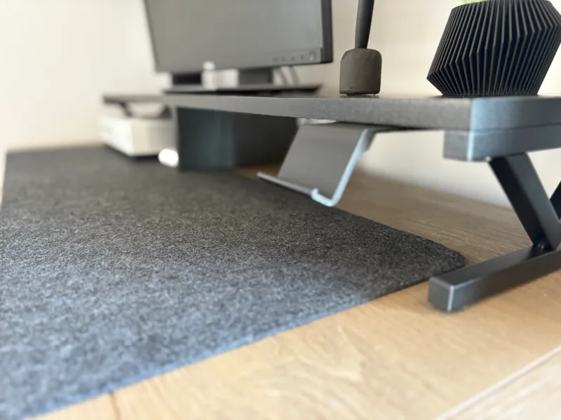 under monitor riser iPhone mount