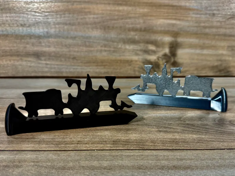 Railroad Spike with Train Silhouette