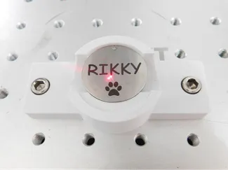 Dog tag jig for fiber laser