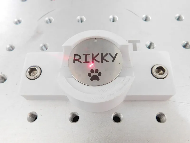 Dog tag jig for fiber laser