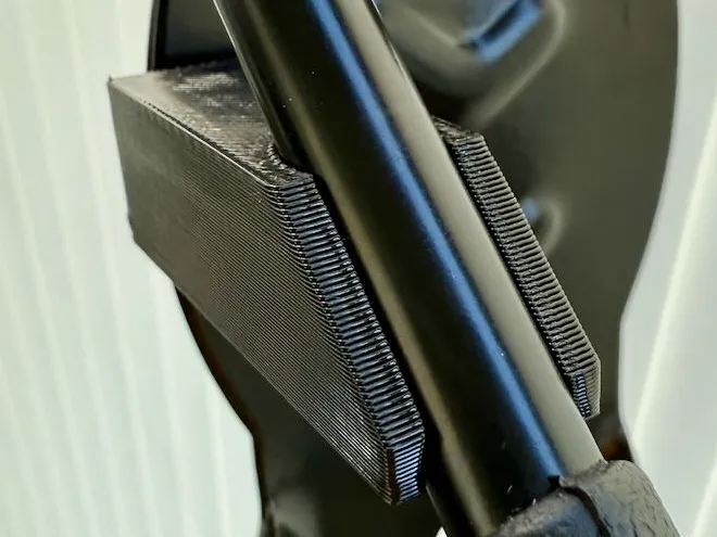 Bike wall hanger hook retainer