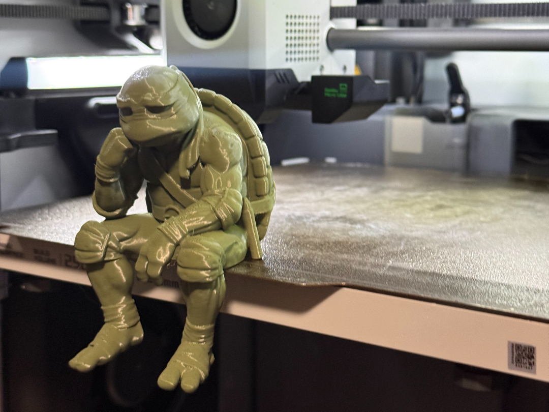 Sad Ninja Turtle Michelangelo on a Ledge Figurine