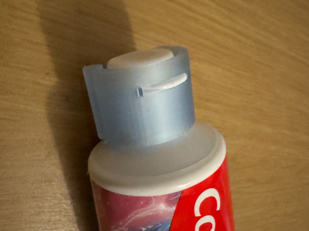 Toothpaste Cap Locking Clip