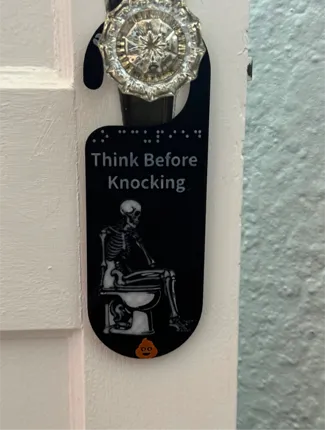 Thinking Skeleton Door Sign