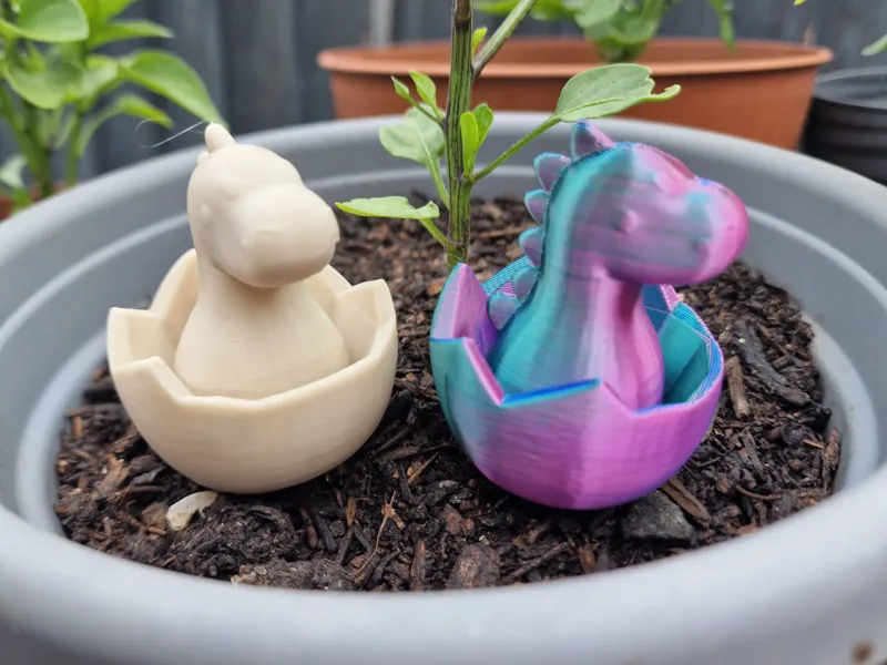 Baby dino in egg