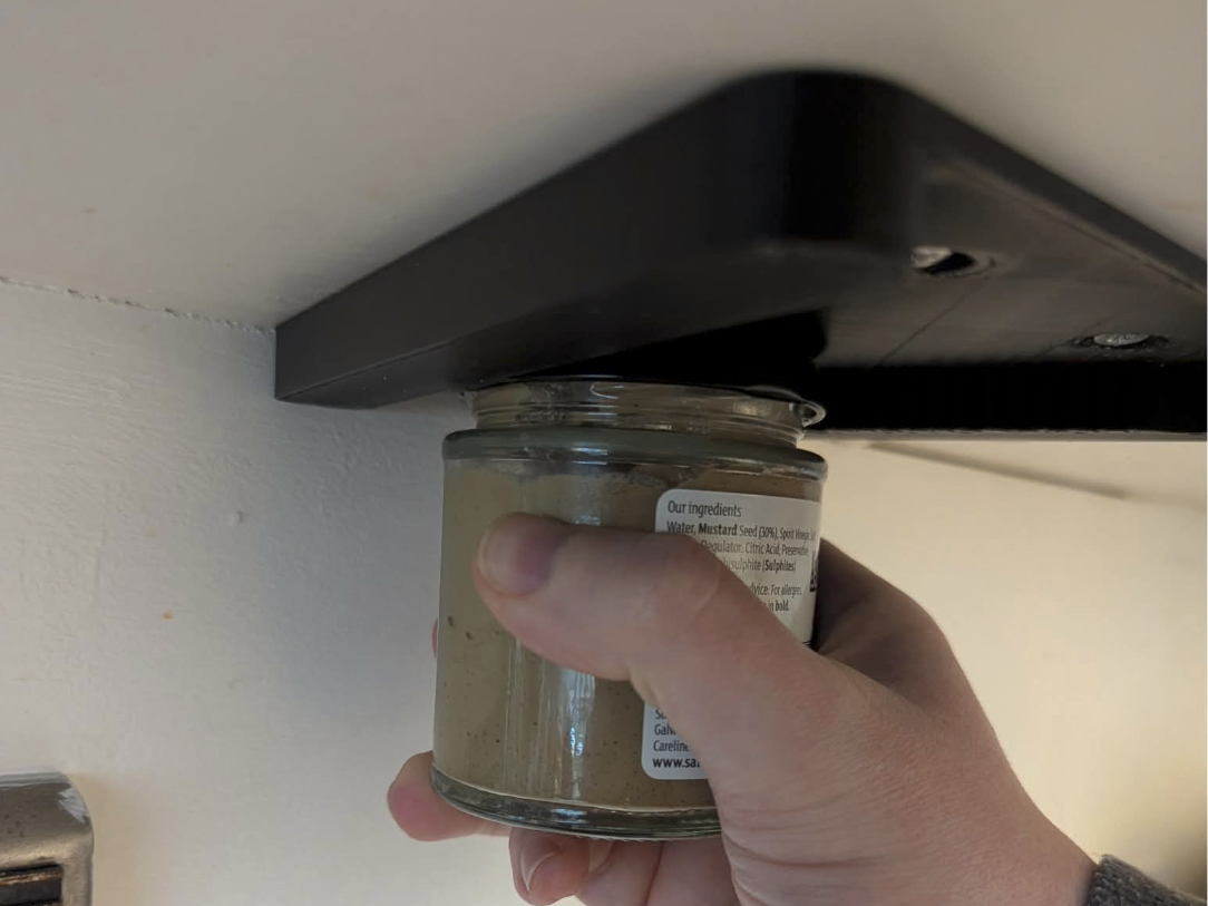 Under cupboard 1 handed jar opener