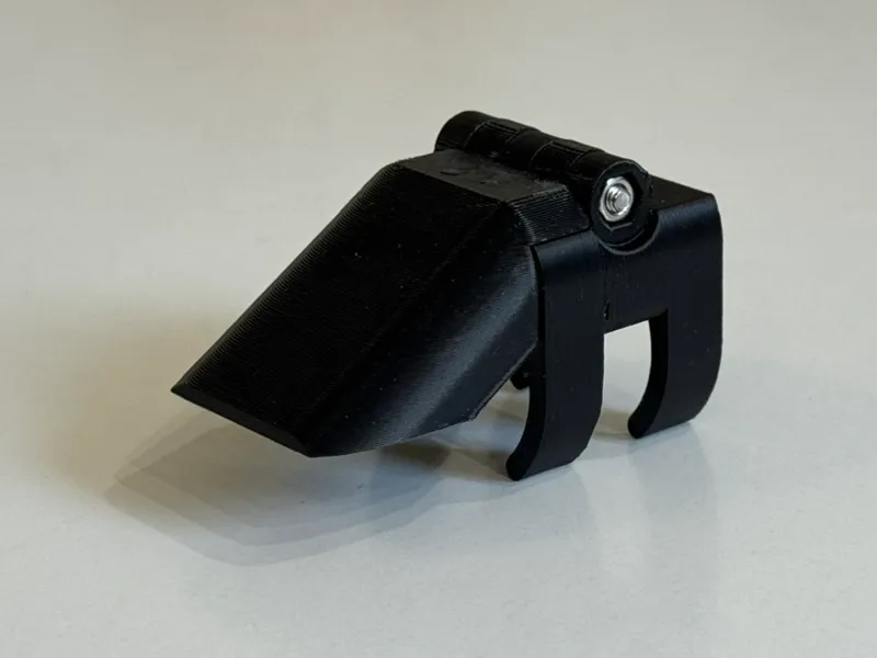 Folding anti-dazzle cap for bike flashlight