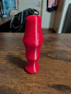 Gyroid fill, smoothed slopes, & fuzzy handle for better Grip
