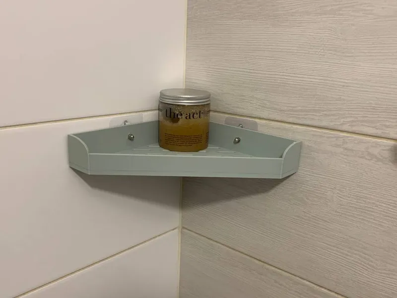 Corner shower shelf