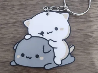 Llavero de gatitos felices