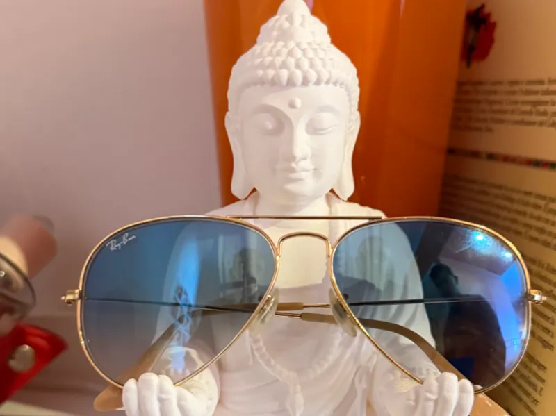 Buddha glasses holder