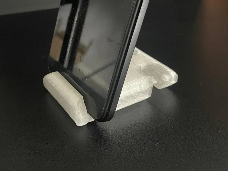 Phone stand with open speakers