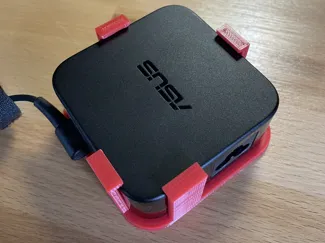 Under desk bracket for ASUS screens power supply