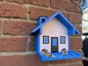 Bird House with standard front, funnel and chimney cap