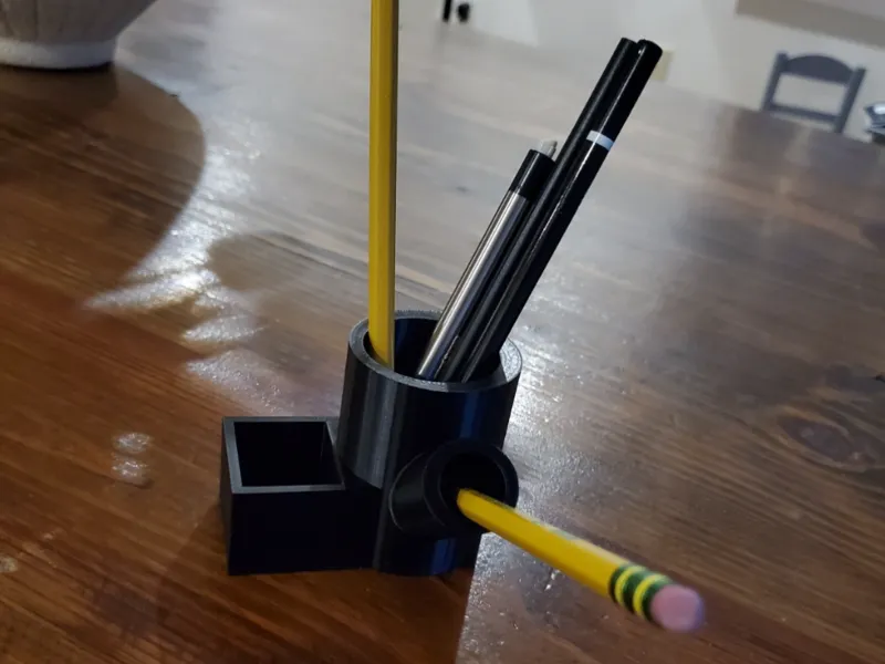 Pencil and pen holder