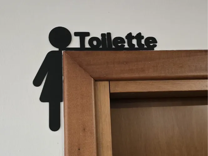 Toilette Donna decorazione sopra porta