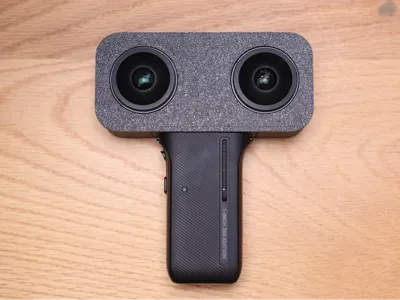 insta360 one rs 1-inch panoramic camera modified into a VR180 spatial video camera with custom casing
