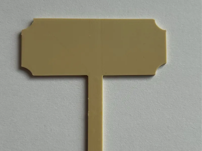 Schild mit Spieß für Häppchen