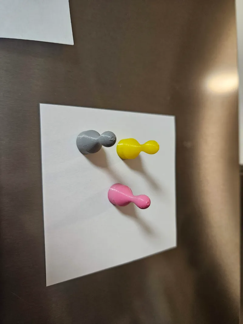Game piece, neodymium magnet holder