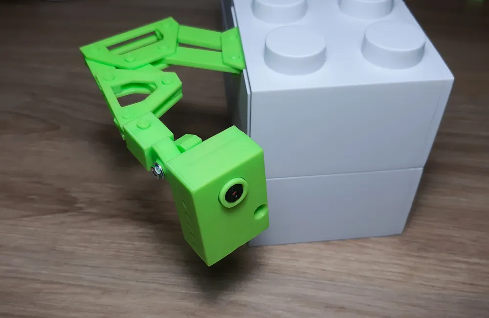 A green modular ESP32 CAM Case that can be fit like blocks