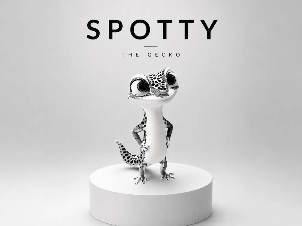 Letrero o emblema decorativo: Spotty the Gecko. Referencia del modelo original.