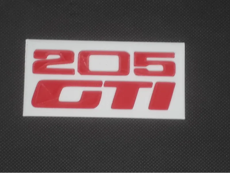 Plaque logo Peugeot 205 GTI
