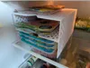 2 compartments w/ 50mm height each, 155mm width, 200mm depth