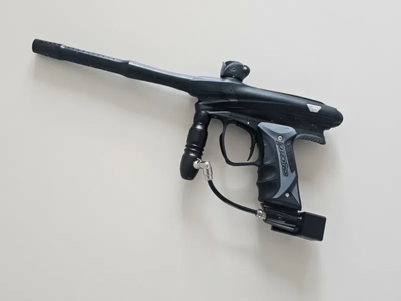 Wall-mounted paintball marker holder
