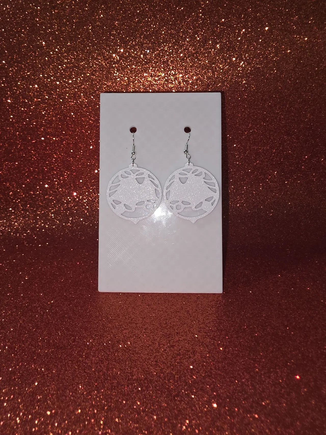 Christmas bells in a ball earrings view 2