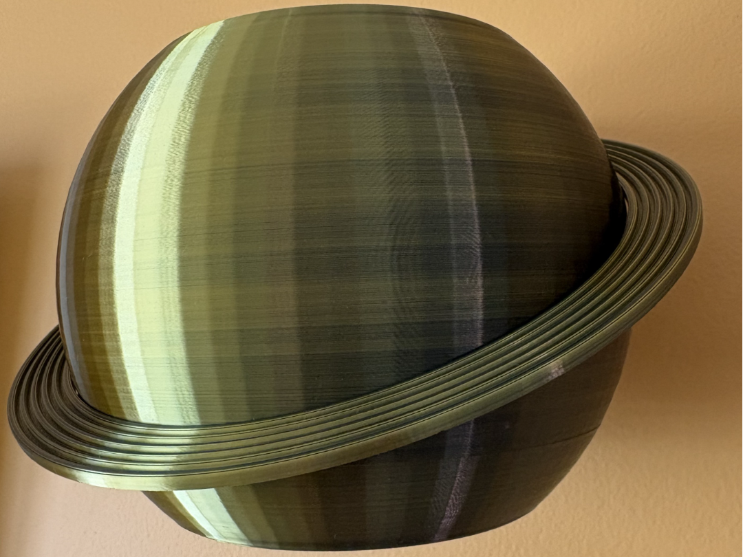 Cosmic planet wall planter with driptray