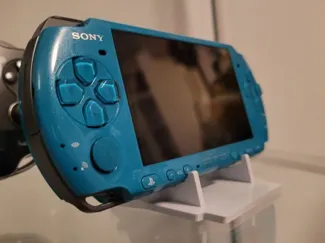 Universal stand for handheld consoles and CD / DVD